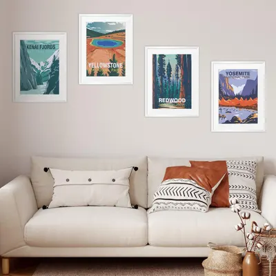 Demonstrates how the national park poster prints look when displayed in a real home setting, helping shoppers visualize the product in their own living space.