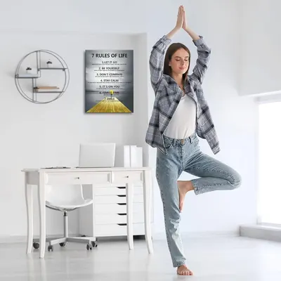 Demonstrates the product (wall art poster) in a real-world home setting to help shoppers visualize how it would look in their own space and lifestyle.