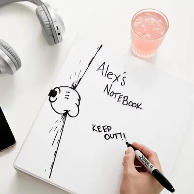 Shows the notebook in a natural, everyday lifestyle setting to help shoppers visualize how they might use the product in their own life.