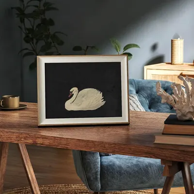 Demonstrates how the framed artwork fits naturally into a modern home setting, helping shoppers visualize the product in their own living space.