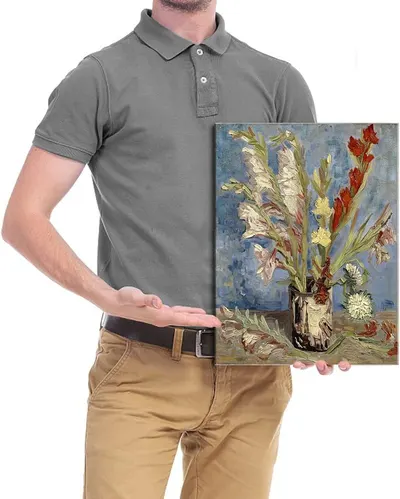Demonstrates the physical size of the canvas/artwork by showing it held by a person, providing shoppers with a clear visual reference for scale and helping them understand how large the product is…