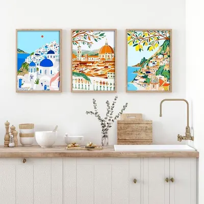 Demonstrates how the framed art prints look when displayed in a real kitchen setting, helping shoppers visualize the product in their own home.
