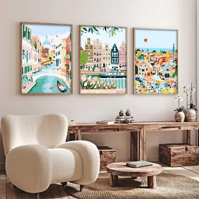 Demonstrates how the product (framed art prints) looks when displayed in a real-world home setting to help shoppers visualize the product in their own space.