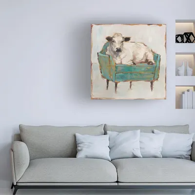 Demonstrates how the product (wall art/canvas print) looks when displayed in a real-world living room setting to help shoppers visualize it in their own home.