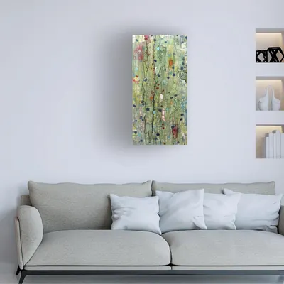 Demonstrates how the product (abstract canvas wall art) looks when displayed in a real living room setting, helping shoppers visualize it in their own home.