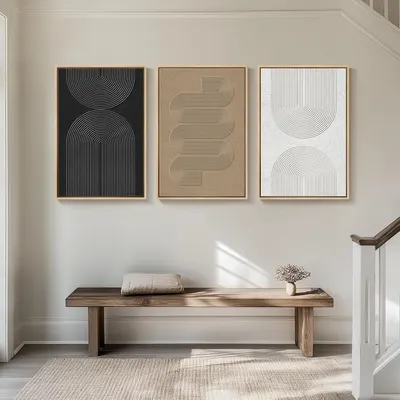 Demonstrates how the product (wall art set) looks when displayed in a real home environment, helping shoppers visualize the aesthetic and scale in their own space.