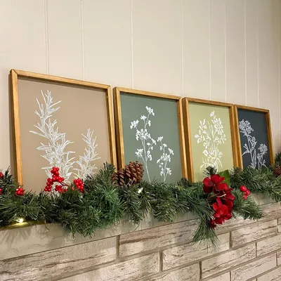 Positions the framed botanical art prints as seasonal home decor items, perfect for holiday gifting or festive home styling during Christmas. Shows the product in a real-world home setting to help…