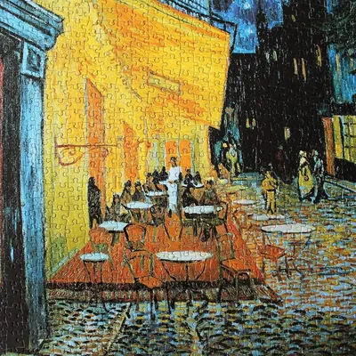 Displays the product (jigsaw puzzle) in a completed lifestyle context, showing the artistic scene it creates to help shoppers visualize the finished result and aesthetic appeal.