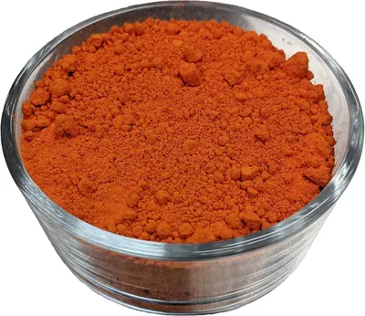 Shows the product in its clear container on a white background to give shoppers a clean, unobstructed view of the orange powder product and its texture.