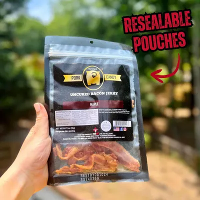 Highlights the resealable pouch feature to communicate convenience and freshness preservation for the bacon jerky product.