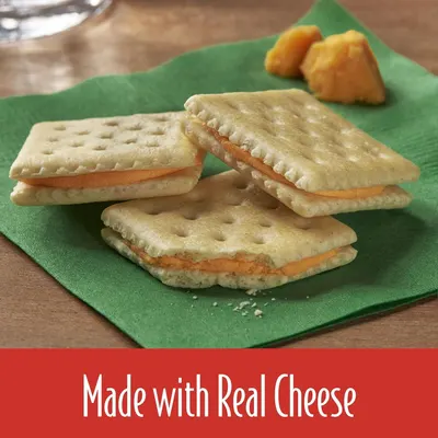Communicates that the product is made with real cheese as a key ingredient, reassuring shoppers about quality and authentic flavor.