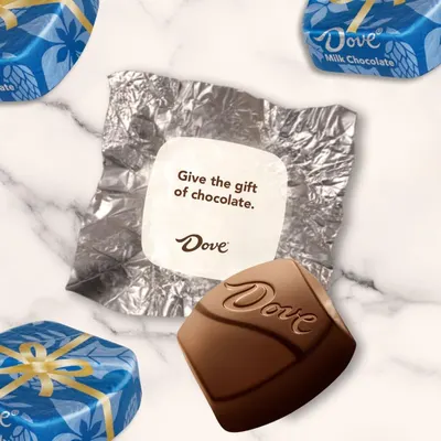 Positions Dove chocolate as a perfect gift option, encouraging shoppers to purchase for gifting occasions with the message 'Give the gift of chocolate.'