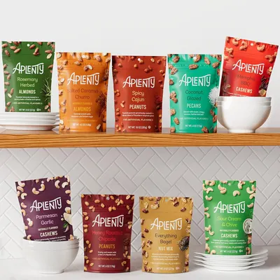 Displays the full range of Aplenty flavored nut products to help shoppers understand the variety of options available and choose their preferred flavor.