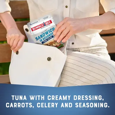 Demonstrates the product's convenience and portability as a quick, ready-to-eat meal option that fits easily into a bag for on-the-go consumption.