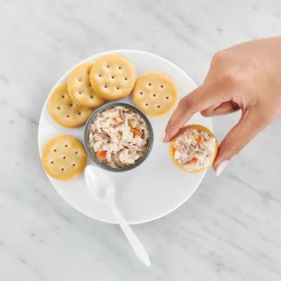 Demonstrates the product being enjoyed in a natural, everyday setting to help shoppers visualize how they would use and serve the product in their own homes.