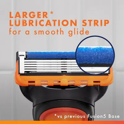 Highlights the enhanced lubrication strip feature of the razor blade, emphasizing its larger size compared to the previous model for a smoother, more comfortable shave. Communicates the primary…