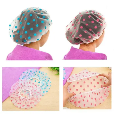 Demonstrates the shower cap in use on a person's head and shows the product's construction and flexibility through multiple angles and contexts to help shoppers understand how it works and fits.