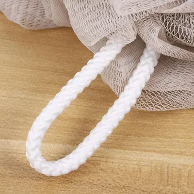 Shows the product (white braided rope/cord) alongside its raw material (white mesh netting) in a clean, catalog-style presentation to help shoppers understand what they're purchasing.