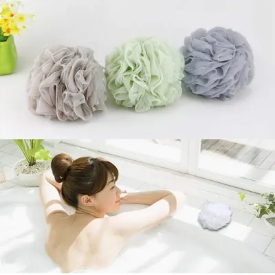 Showcases the available color options for the bath sponge product line, helping shoppers choose their preferred variant. Demonstrates the product in use during a relaxing bath, showing shoppers the…
