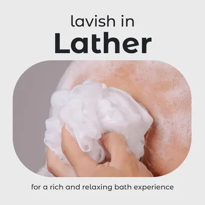 Communicates that the product creates a luxurious, rich lather for a relaxing and indulgent bath experience.