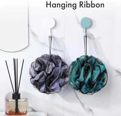 Demonstrates the product's convenient hanging ribbon feature, showing shoppers how the loofah can be easily stored and dried in the shower or bathroom.