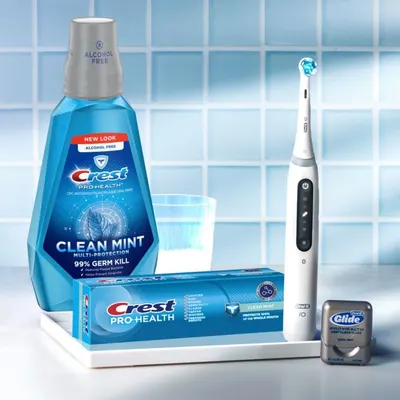 Shows the customer everything included in the oral care bundle: mouthwash, toothpaste, electric toothbrush, and floss, demonstrating the comprehensive value of the purchase.