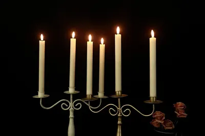 Showcases the product in an elegant, atmospheric setting to communicate its aesthetic appeal and ability to create a warm, sophisticated ambiance in real-world use.