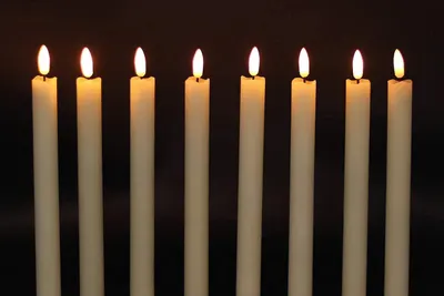 Showcases the product in a real-world setting to demonstrate its aesthetic appeal and ambient lighting effect, helping shoppers visualize the candles in use.