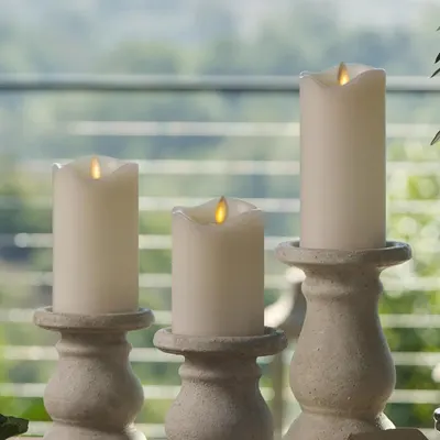 Showcases the product in a real-world home setting to help shoppers visualize how the flameless candles would look in their own space, creating an inviting and peaceful atmosphere.
