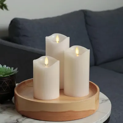 Showcases the product in a real-world home setting to help shoppers visualize how the candles would look and create ambiance in their own living space.