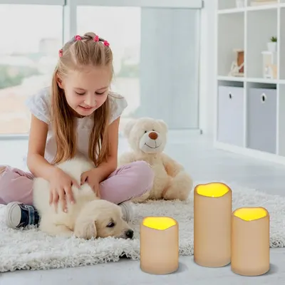 Demonstrates the product (LED candles) in a real-world home setting with a child and pet, showing it creates a safe, warm ambiance without the hazards of real flames.