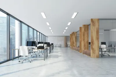 Showcases the product (office furniture, lighting, or architectural elements) in a real-world professional office setting to help shoppers visualize how it would look and function in their own…
