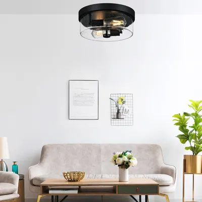 Demonstrates how the ceiling light fixture looks when installed in a real living room environment, helping shoppers visualize the product in their own home.