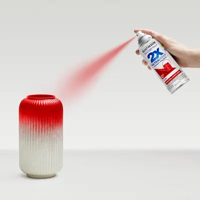 Demonstrates how to apply the spray paint product to achieve an even, professional finish on objects like the vase shown. Shows the ease of use and quality results achievable with the Rust-Oleum 2X…