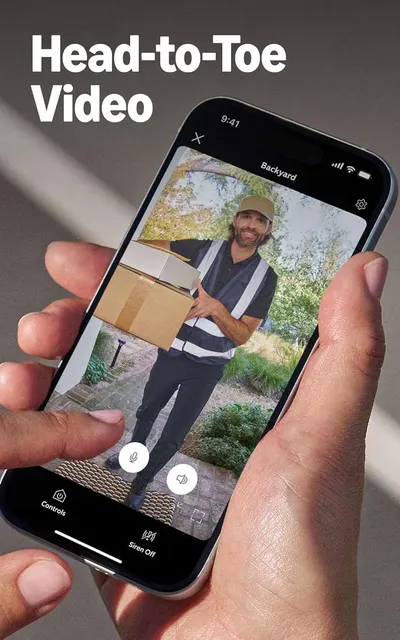 Demonstrates the product's video capability that captures full-body footage, reassuring shoppers they can monitor visitors from head to toe.
