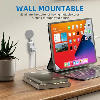 Highlights the wall-mountable design to communicate the benefit of eliminating cord clutter and creating a cleaner, more organized workspace.