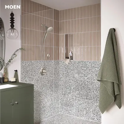 Showcases the shower system installed in a real-world bathroom setting to help shoppers visualize how the product looks and fits in a contemporary home environment.
