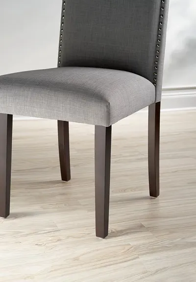 Showcases the product in a real-world home environment to help shoppers visualize how the chair would look in their own space.