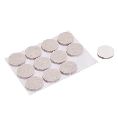 Provides a clean, catalog-style view of the felt furniture pads showing the product and its packaging arrangement without any distractions.
