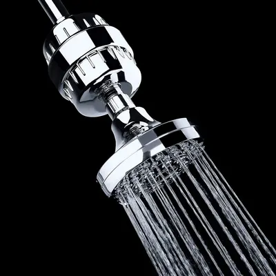 Provides a clean, professional catalog-style image of the shower filter product to show its chrome finish and design details without distractions.