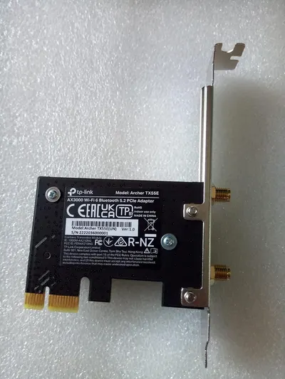 Provides a clean, catalog-style view of the TP-Link Wi-Fi 6 Bluetooth PCIe adapter showing the product's physical form, connectors, and label details without any distractions.