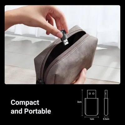Demonstrates the small physical size of the USB device with exact measurements to reassure shoppers it is highly portable and easy to store. Highlights the product's compact and portable nature,…