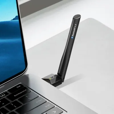 Demonstrates the product's compatibility with Bluetooth 5.3 technology and its use with laptops, reassuring shoppers that it works seamlessly with their devices.