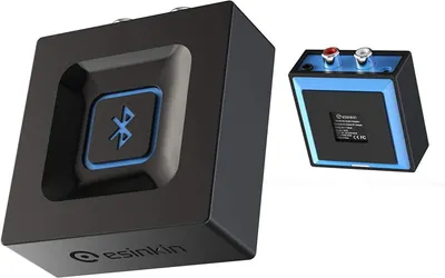 Displays the Bluetooth audio receiver from multiple angles on a clean white background to show the product design, Bluetooth connectivity feature, and brand labeling without distractions.