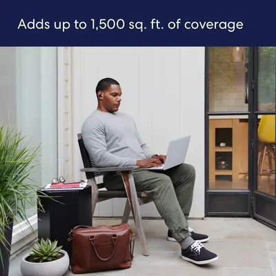 Communicates the product's wireless range capability of 1,500 sq. ft. to reassure shoppers that it will work throughout their home or office space. Shows the product being used in a real-world…