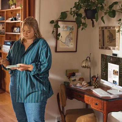 Demonstrates the product being used naturally in a real-world home office environment to help shoppers visualize the product in their own daily life.