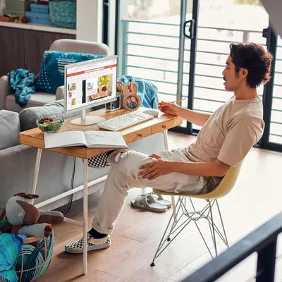 Demonstrates the product in a real-world home office environment to help shoppers visualize how it fits into their daily lifestyle and workspace.