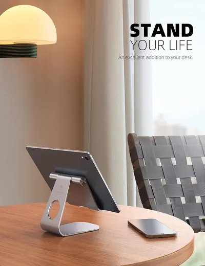 Demonstrates the product in a real-world office or home setting to help shoppers visualize how the tablet stand fits into their workspace and lifestyle.