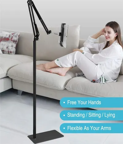 Communicates the product's versatility by highlighting three distinct benefits: hands-free operation, usability in multiple positions (standing, sitting, lying), and flexible arm adjustability for…