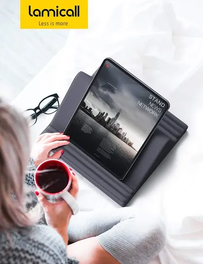 Demonstrates the product in a natural, everyday setting to help shoppers visualize how the tablet case fits into their lifestyle, showing it being used comfortably for reading or browsing.